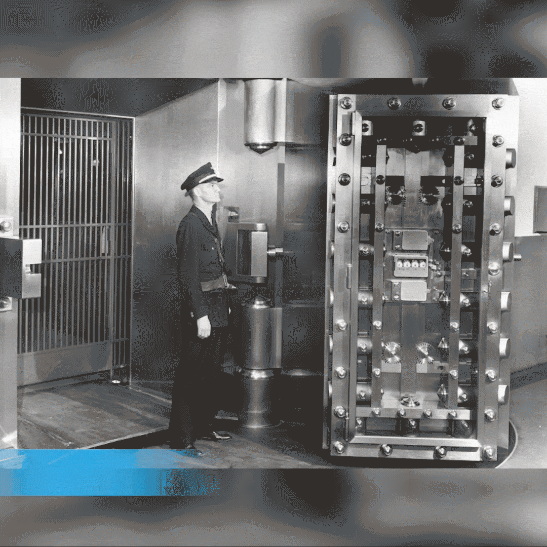 A man in uniform and cap stands in a vault doorway; people in business attire line up in a hallway; a man leans out a teller window with the word ‘Credit’ on top.